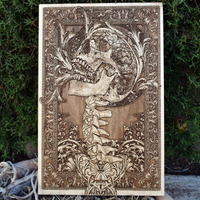 Screaming skull wood artwork with gothic spine, perfect for horror wall decor and gothic home design.