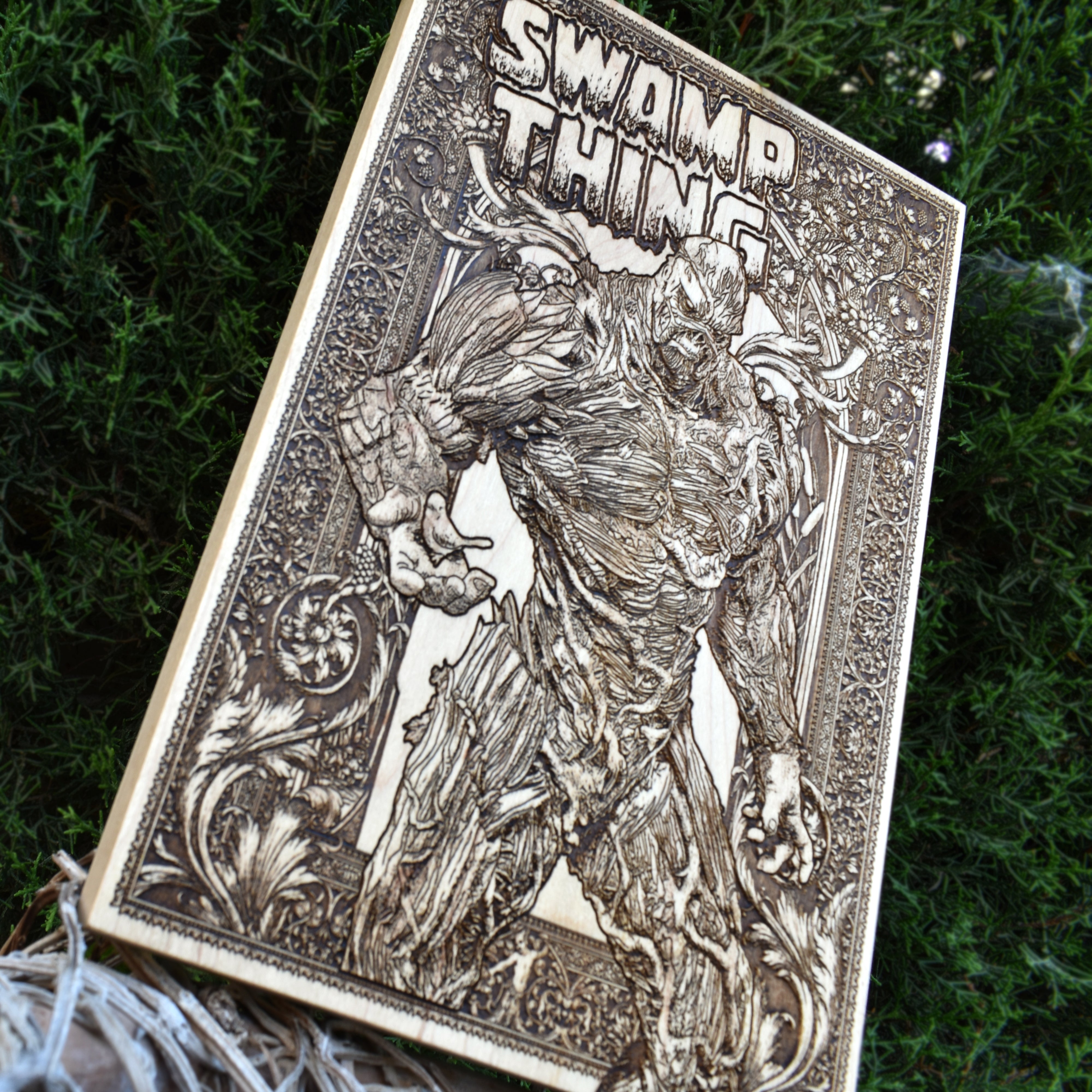 Engraved Swamp Thing creature on wood – unique dark fantasy wall art for collectors.