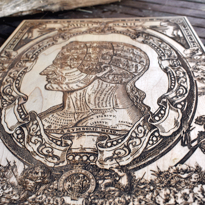 Intellectual wooden wall art featuring surreal symbolic head.