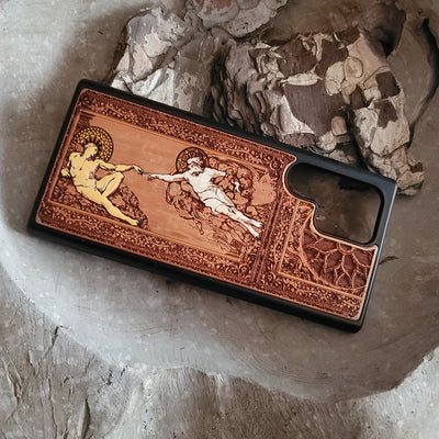 Adam and Eve gothic artwork engraved on a wooden phone case, compatible with iPhone and Samsung Galaxy
