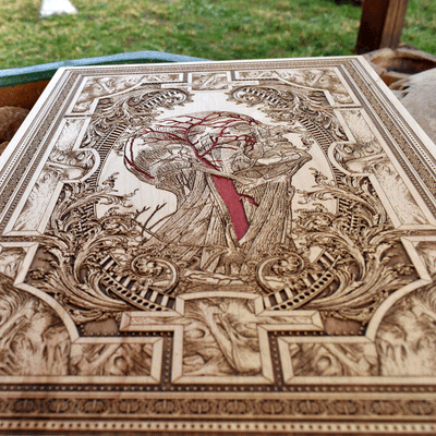 Human anatomy chart engraved on wood for study or office