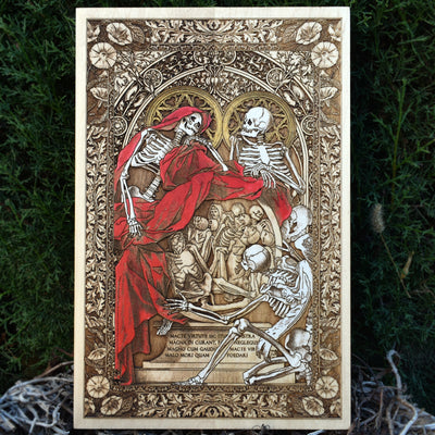 Gothic skeleton couple wall art engraved on red wood, symbolizing eternal love and death.
