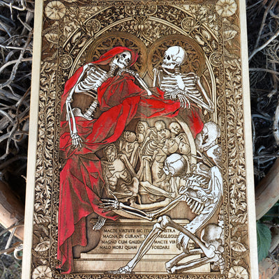 Skeleton wall decor with romantic death theme, personalized on cherry-stained wood.