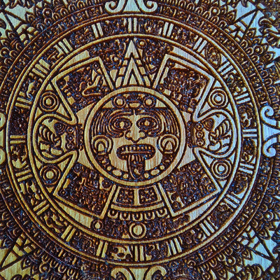 Aztec Calendar wooden phone case featuring detailed engraving, compatible with iPhone & Samsung Galaxy. Eco-friendly and durable design with intricate artwork.