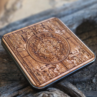 Aztec Calendar Wireless Charger in use with iPhone showing fast wireless charging