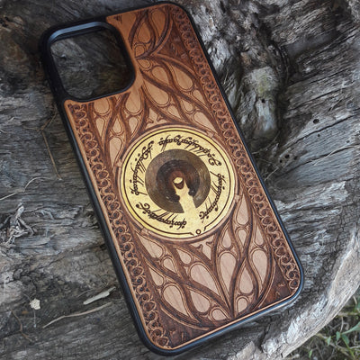 Wooden phone case for iPhone & Samsung Galaxy featuring The Dark Tower design from Lord of the Rings. Laser-engraved with intricate details for a unique look. Compatible with iPhone , 15, 14, 13, 12, 11 Pro Max Mini & Samsung Galaxy S, S24, S23, S22, S21, S20 Ultra Plus Note 20. Durable, slim, and stylish. Perfect for Lord of the Rings fans. Order now!