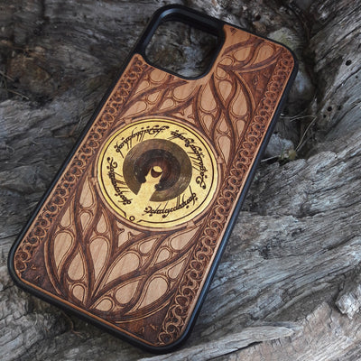Wooden phone case for iPhone & Samsung Galaxy featuring The Dark Tower design from Lord of the Rings. Laser-engraved with intricate details for a unique look. Compatible with iPhone , 15, 14, 13, 12, 11 Pro Max Mini & Samsung Galaxy S, S24, S23, S22, S21, S20 Ultra Plus Note 20. Durable, slim, and stylish. Perfect for Lord of the Rings fans. Order now!