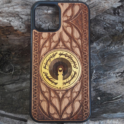 Wooden phone case for iPhone & Samsung Galaxy featuring The Dark Tower design from Lord of the Rings. Laser-engraved with intricate details for a unique look. Compatible with iPhone , 15, 14, 13, 12, 11 Pro Max Mini & Samsung Galaxy S, S24, S23, S22, S21, S20 Ultra Plus Note 20. Durable, slim, and stylish. Perfect for Lord of the Rings fans. Order now!