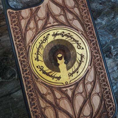 Wooden phone case for iPhone & Samsung Galaxy featuring The Dark Tower design from Lord of the Rings. Laser-engraved with intricate details for a unique look. Compatible with iPhone , 15, 14, 13, 12, 11 Pro Max Mini & Samsung Galaxy S, S24, S23, S22, S21, S20 Ultra Plus Note 20. Durable, slim, and stylish. Perfect for Lord of the Rings fans. Order now!