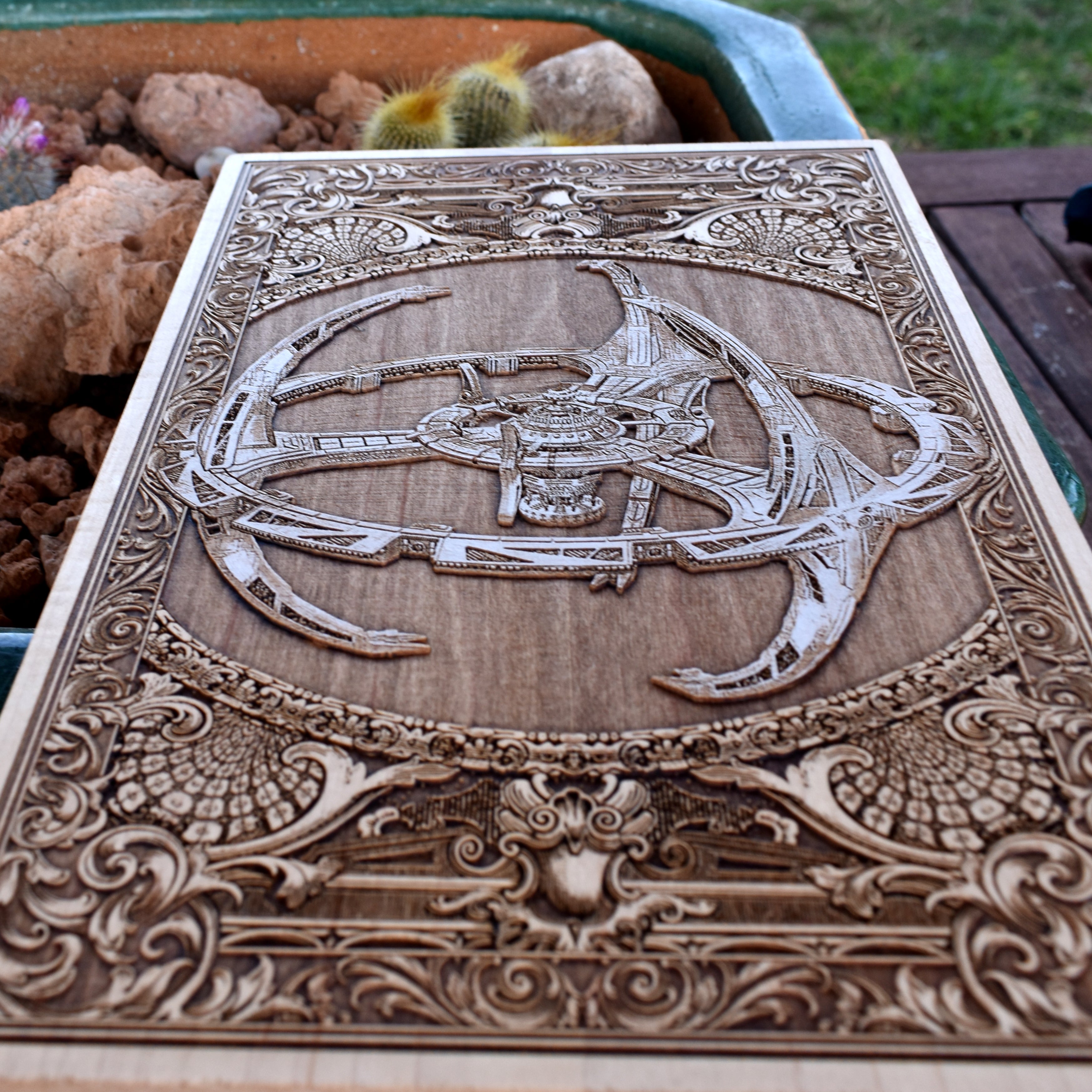 Detailed Enterprise-inspired starship wall art engraved on wooden panel.