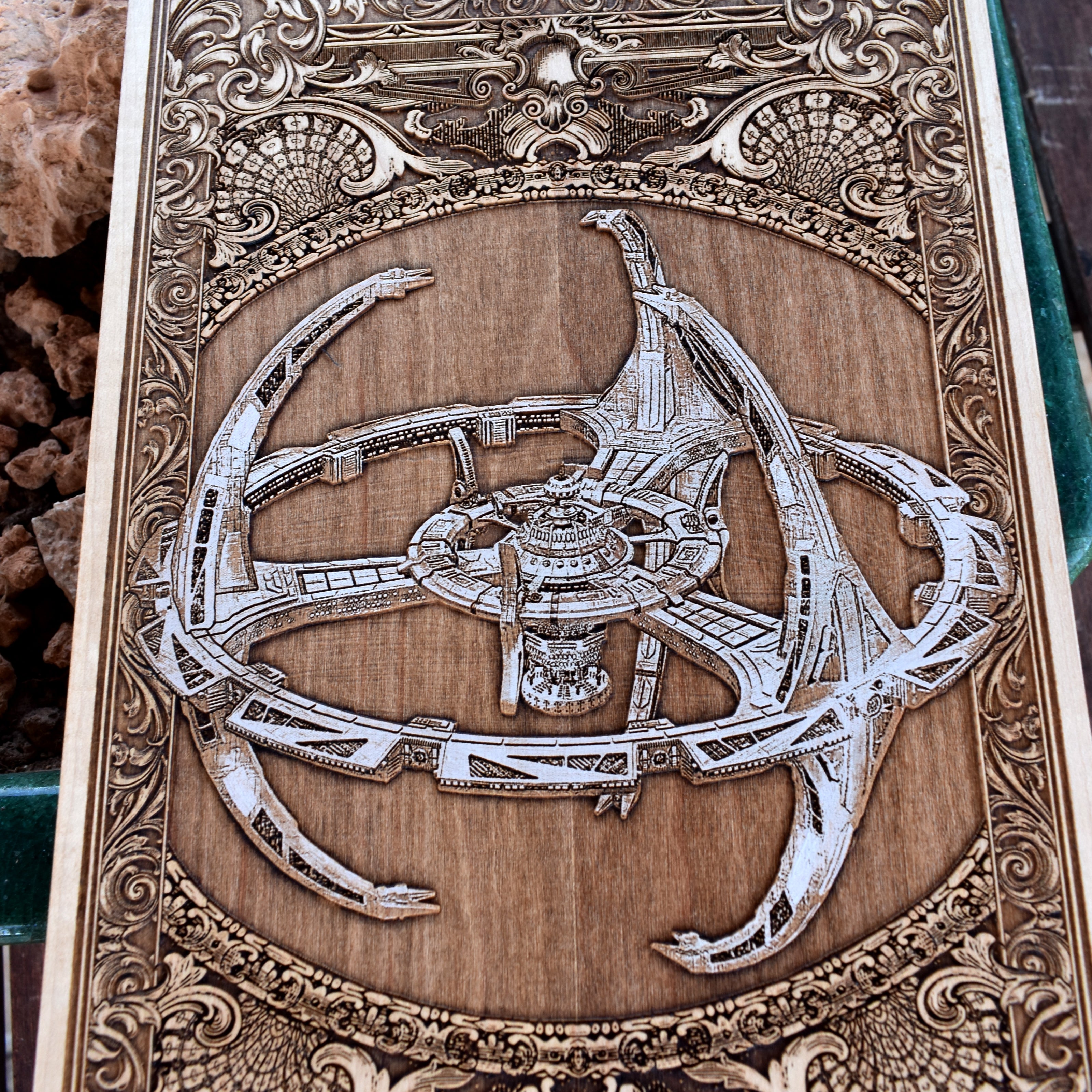 Anatomical spaceship illustration hand-painted on rustic wood board.