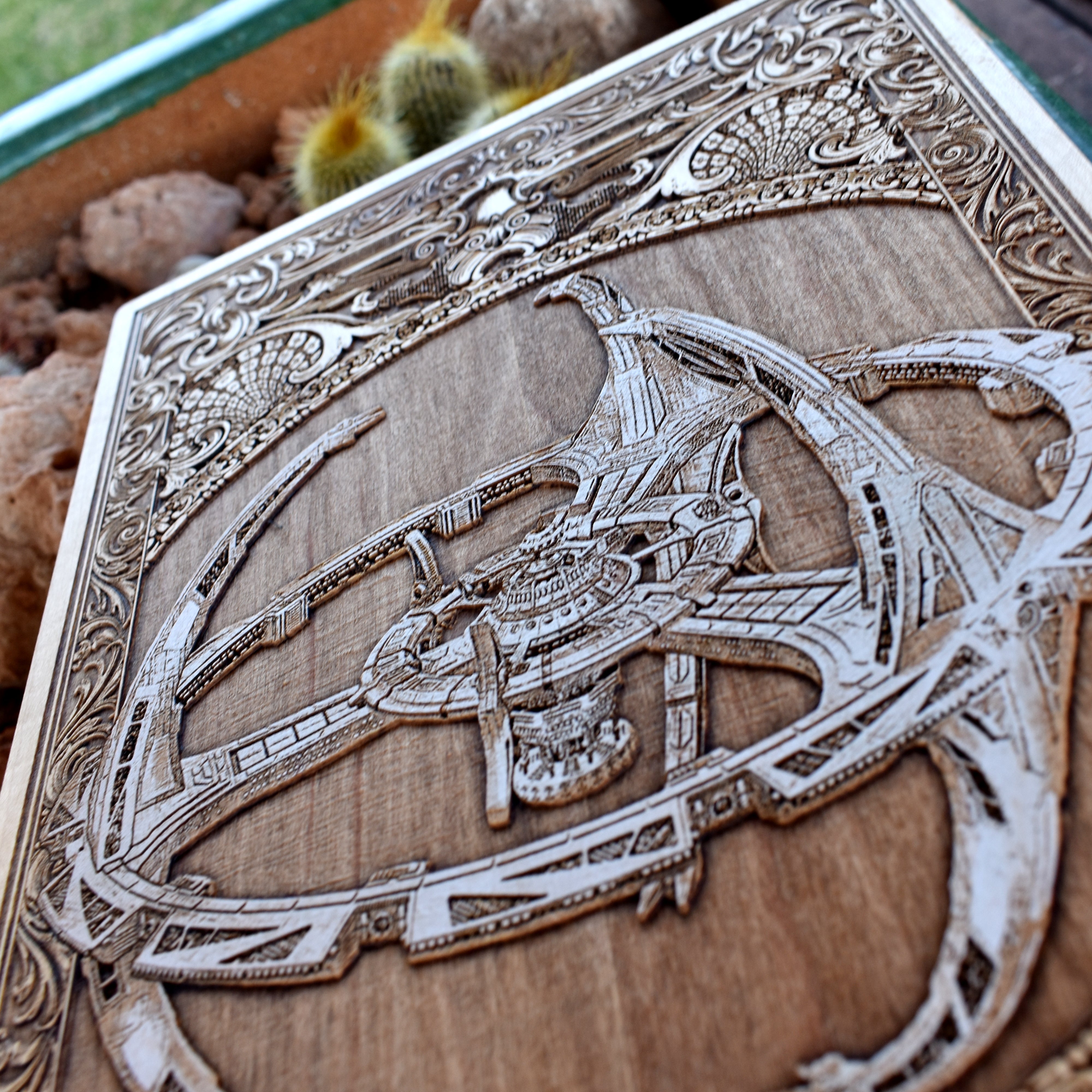 Unique wood art of sci-fi spaceship cutaway, ideal for collectors and fans.