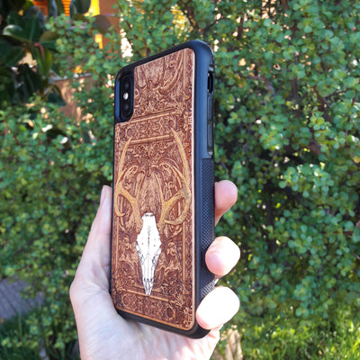Deer skull wooden phone case, hand-painted and laser-engraved on cherrywood. Compatible with iPhone , Galaxy S, and more. Gothic nature-inspired phone case.
