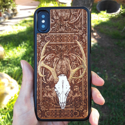 Deer skull wooden phone case, hand-painted and laser-engraved on cherrywood. Compatible with iPhone , Galaxy S, and more. Gothic nature-inspired phone case.