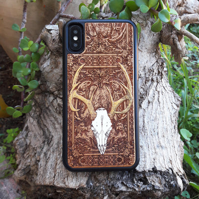 Deer skull wooden phone case, hand-painted and laser-engraved on cherrywood. Compatible with iPhone , Galaxy S, and more. Gothic nature-inspired phone case.