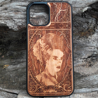 Wooden phone case featuring a detailed Bride of Frankenstein design, perfect for iPhone , Galaxy S, and other popular models. Ideal for horror and gothic fans looking for unique, artistic phone accessories.