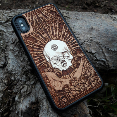 Laser-engraved wooden phone case featuring a detailed skull and cross design, compatible with Samsung Galaxy and iphone