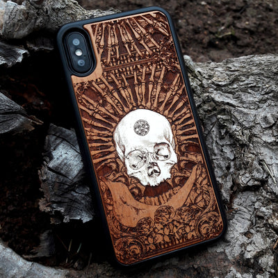 Laser-engraved wooden phone case featuring a detailed skull and cross design, compatible with Samsung Galaxy and iphone