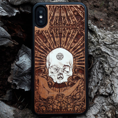 Laser-engraved wooden phone case featuring a detailed skull and cross design, compatible with Samsung Galaxy and iphone