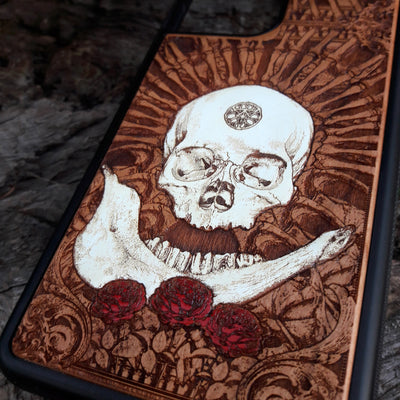 Laser-engraved Celtic Tree of Life design on a wooden phone case, compatible with iPhone and Samsung Galaxy