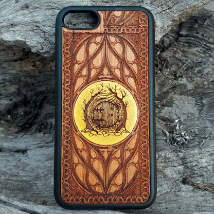 Hand-painted Hobbit Door wood phone case, inspired by Lord of the Rings, featuring a beautiful gold accent and intricate detailing. Laser-engraved for a unique design, this case is compatible with iPhone 16, 15, 14, 13, 12, 11, Pro Max Mini, and Samsung Galaxy S25, S24, S23, S22, S21, S20 Ultra, Plus, Note 20. A perfect blend of Tolkien fandom and durable protection.