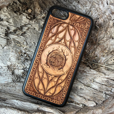 Lord of the Rings Hobbit Door wood phone case, laser-engraved with intricate detailing and decorative patterns. Crafted for durability and elegance, this case is compatible with iPhone , 15, 14, 13, 12, 11, Pro Max, Mini, and Samsung Galaxy S, S24, S23, S22, S21, S20 Ultra, Plus, Note 20. A perfect accessory for Tolkien fans seeking a unique and protective phone case.