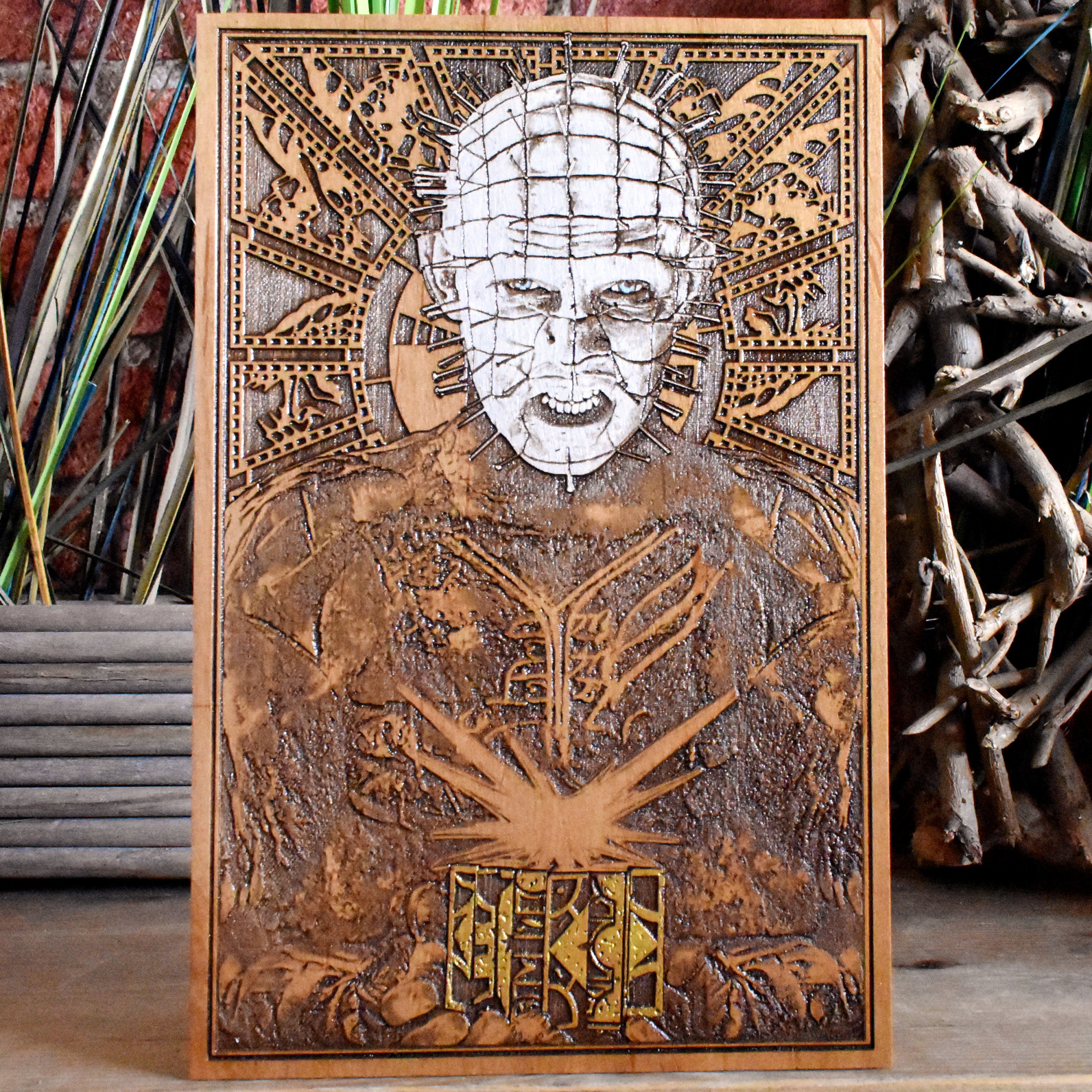 Hand-painted Pinhead from Hellraiser engraved on cedar wood for horror fans.