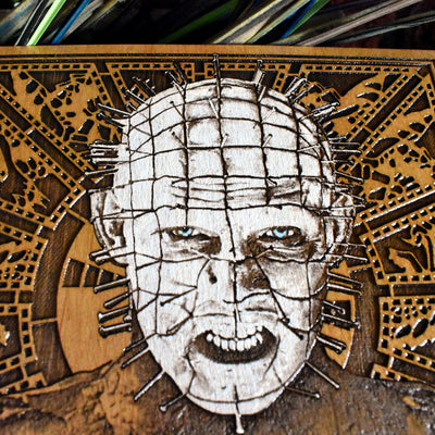 Pinhead horror wall art on wood, a must-have for Hellraiser movie collectors.