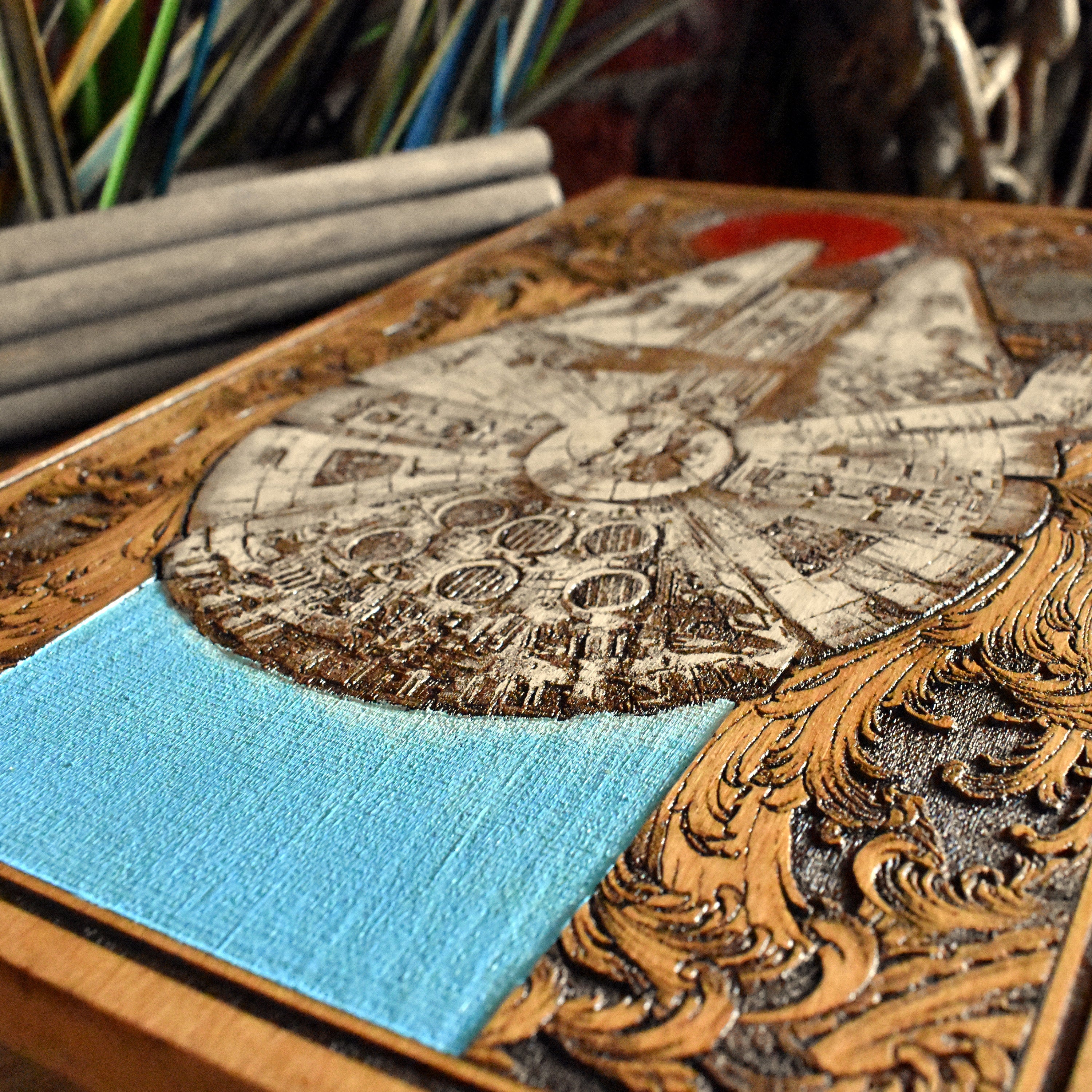 Custom wood art featuring the Millennium Falcon from Star Wars movies.
