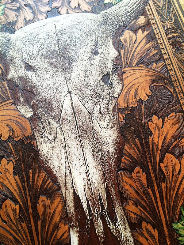 Western-inspired cow skull wooden wall plaque with custom engraving.