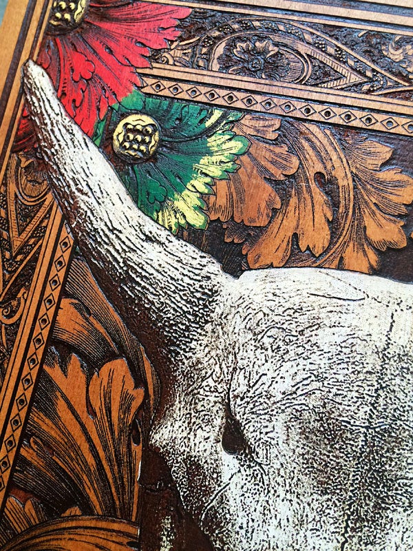 Western-inspired cow skull wooden wall plaque with custom engraving.