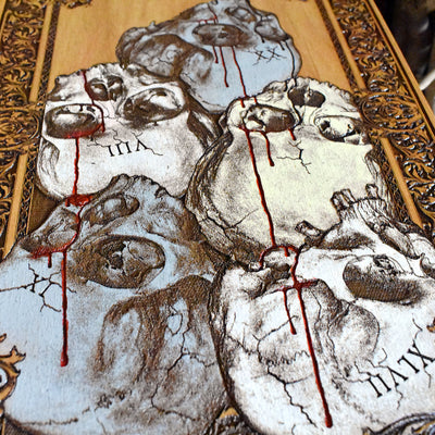 Macabre skull artwork on wood – hand-painted Roman numerals design