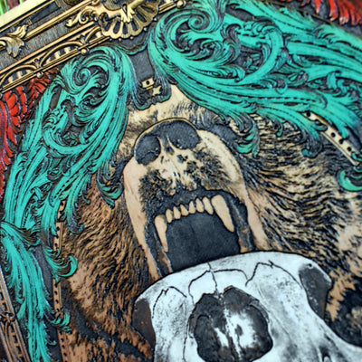 Rustic cabin wall decor with laser-engraved bear skull centerpiece.