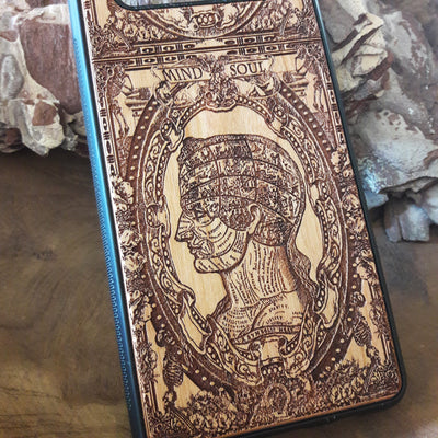 Wooden phone case with gothic skull and skeleton design, handcrafted for iPhone , iPhone 15, Samsung Galaxy S, and more. Unique, durable, and perfect for fans of gothic and dark fantasy art.