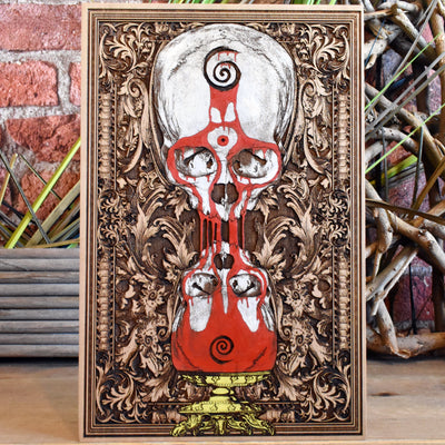 Engraved wooden hourglass with anatomical skulls and flowing blood, symbolizing time and death.