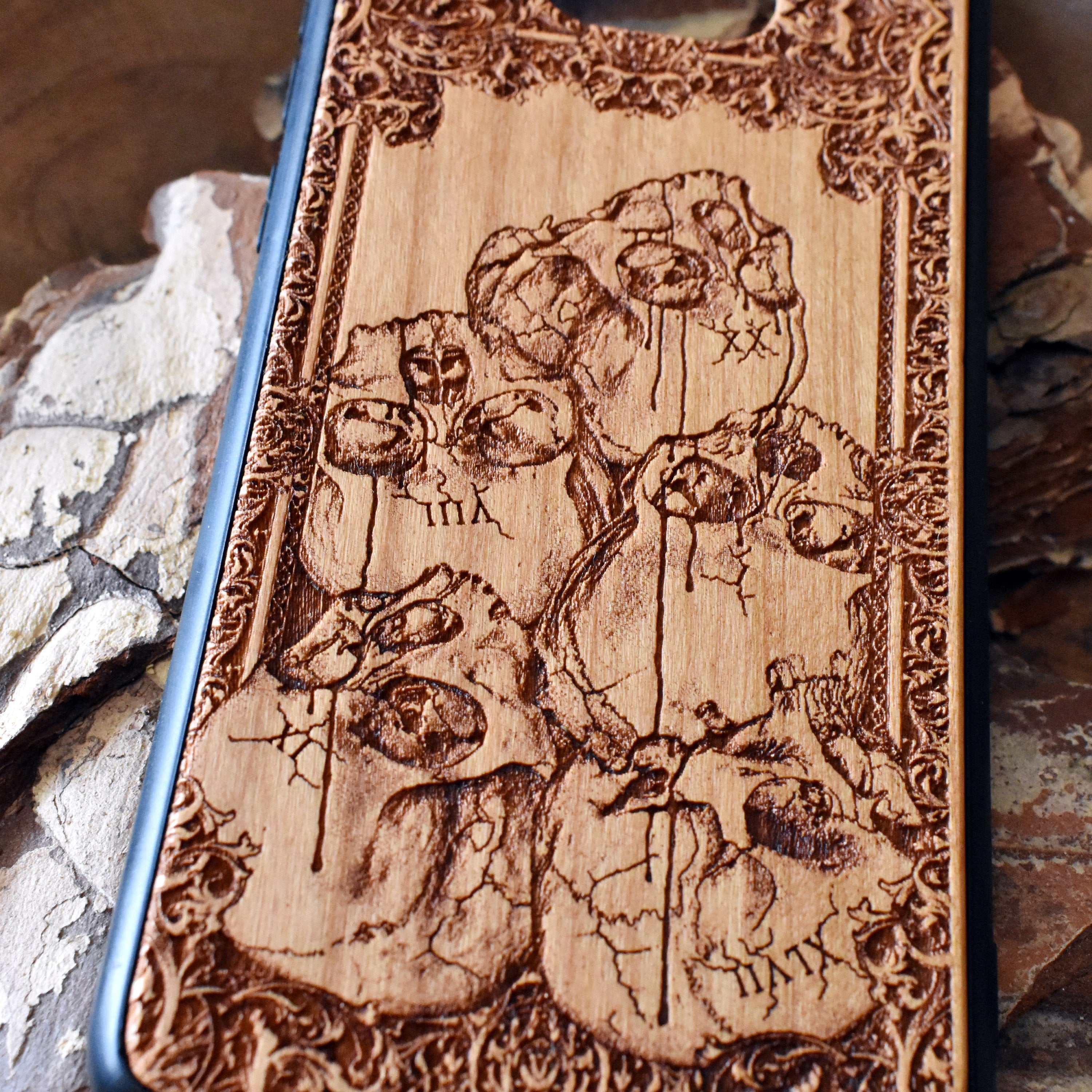 Wooden phone case with intricately carved skull design, ideal for iPhone 16, Samsung Galaxy S25, Note 20, and more. A unique gothic accessory offering durable protection with artistic detail.