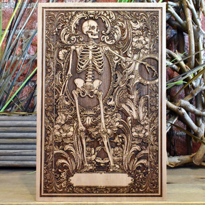 Gothic anniversary gift featuring skull lovers and eternal love quote.