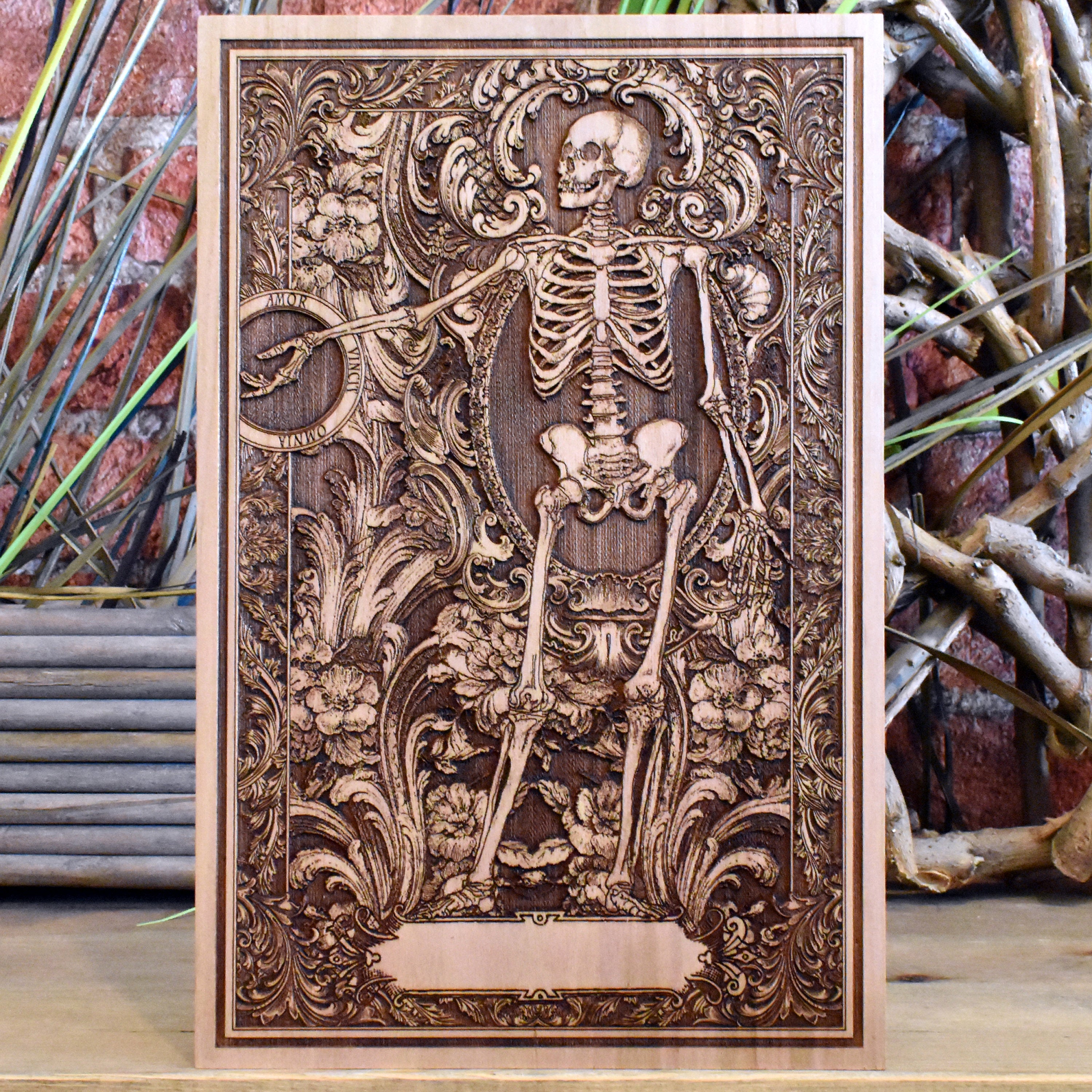 Skull couple wall decor with 'Until Death' engraving on dark wood panel.