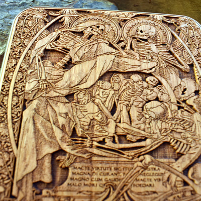 Wireless charging pad featuring Human Souls dark art design for iPhone & Galaxy – fast, reliable charging in a Gothic style