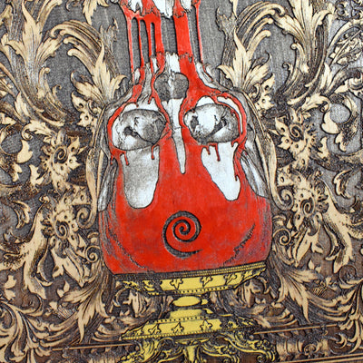 “Time devours all” engraving on skull wood art with vintage style.