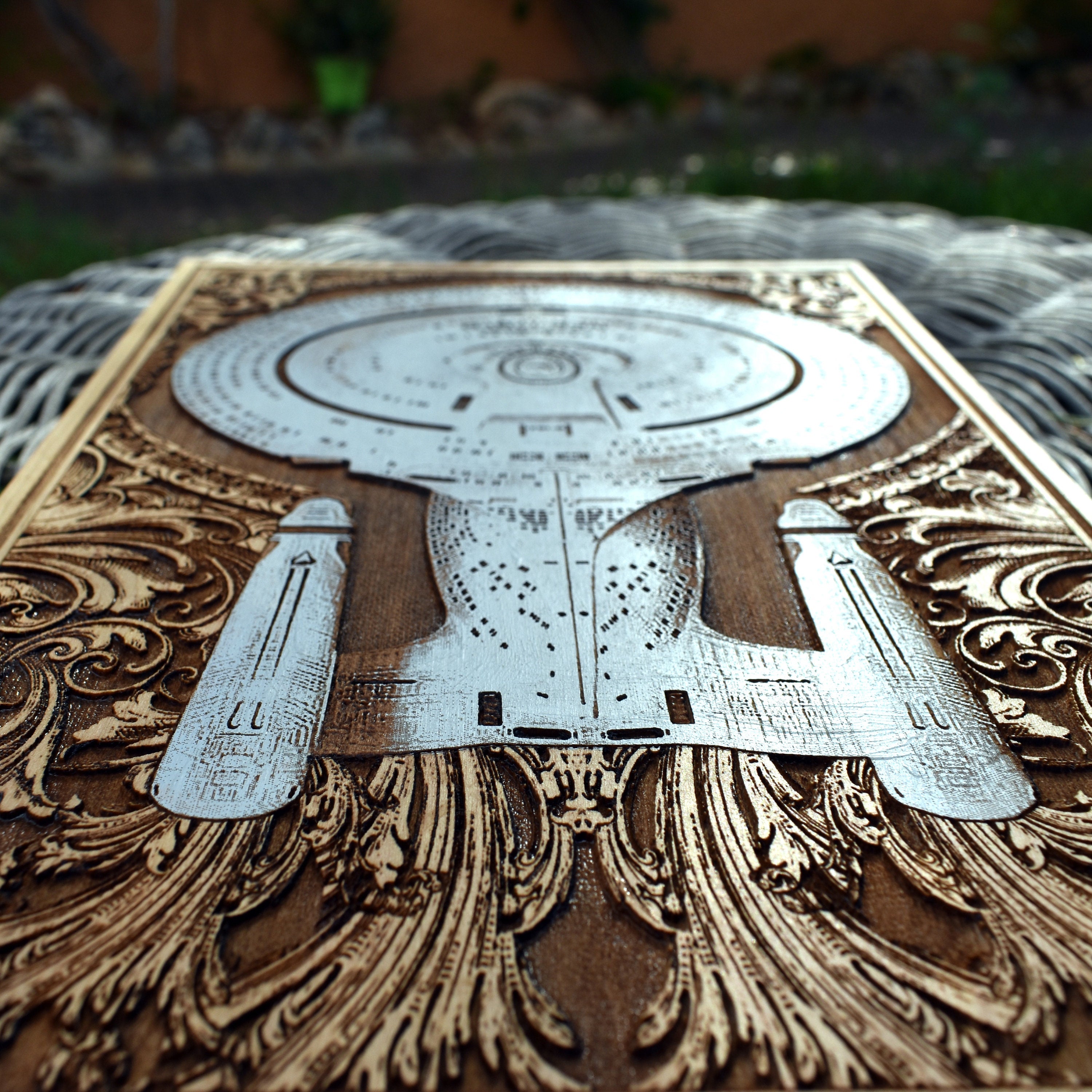 Handcrafted wood wall art of a spaceship, sci-fi home decoration