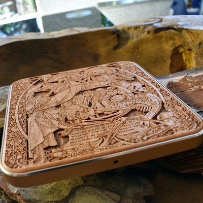 Close-up of detailed Human Souls dark art design on wireless charger – unique and artistic tech accessory for iPhone & Galaxy