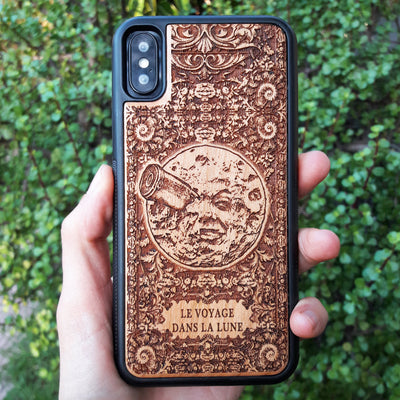 Wooden phone case with detailed laser engraving of 'A Trip to the Moon' design, available for iPhone , iPhone 15, Galaxy S, Note 20, and other models. Perfect for vintage movie fans and space enthusiasts.