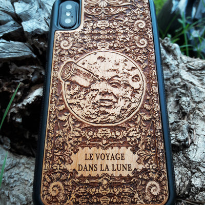 Wooden phone case with detailed laser engraving of 'A Trip to the Moon' design, available for iPhone , iPhone 15, Galaxy S, Note 20, and other models. Perfect for vintage movie fans and space enthusiasts.