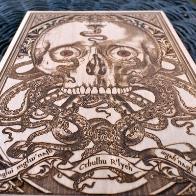 Lovecraftian skull wall art with intricate tentacle engravings