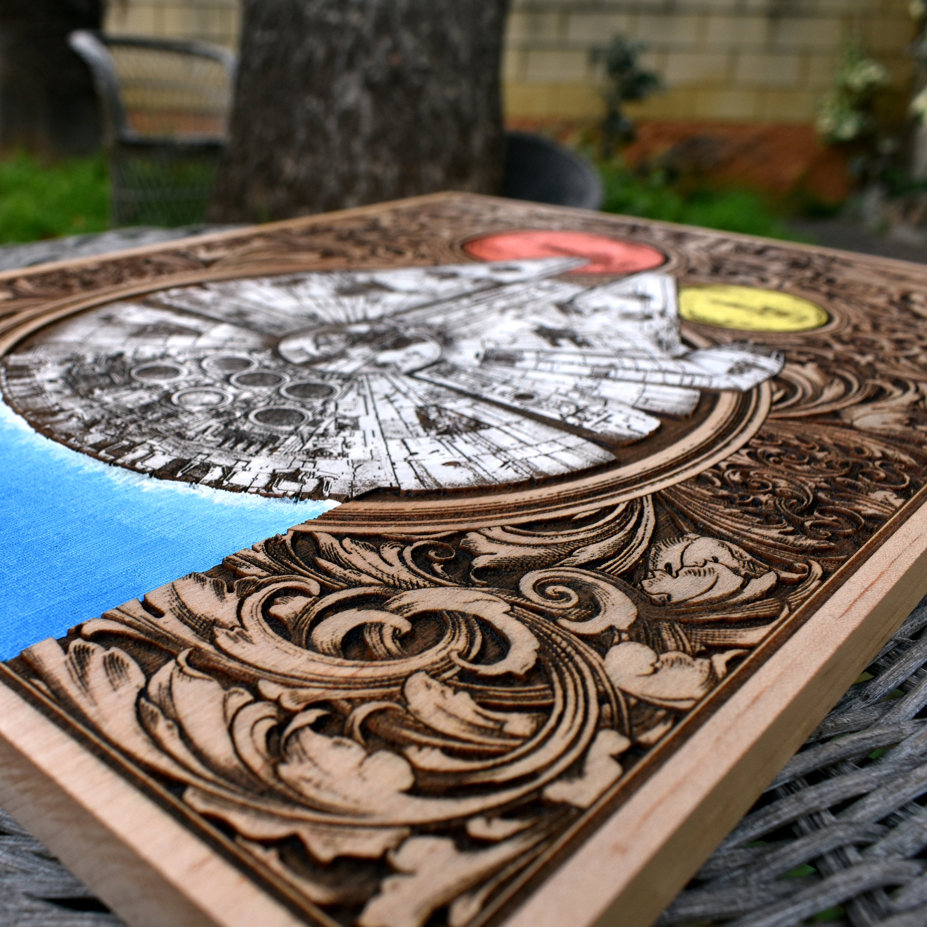 Millennium Falcon carved into maple wood, perfect gift for fans.