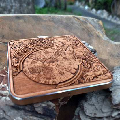 Dark wood wireless charger featuring sci-fi battle ship designs.