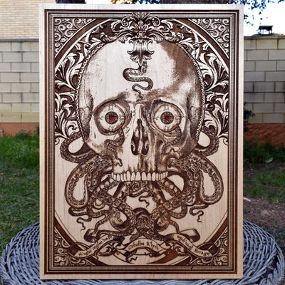 Gothic wood wall art of a skull with Cthulhu tentacles