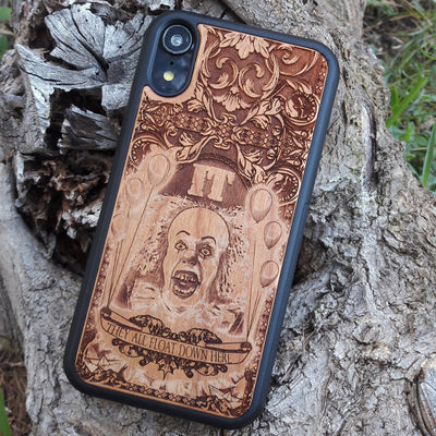 Wooden phone case with Stephen King's It clown design, intricately carved for iPhone , iPhone 15, Galaxy S, S24, Note 20, and more. Ideal for horror fans seeking unique protection and artistic style.
