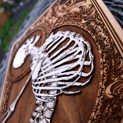 Gothic-style wooden skeleton artwork, handcrafted horror wall decor

